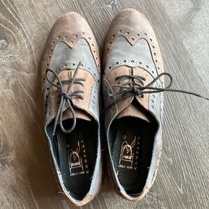 Blue and brown leather brogues